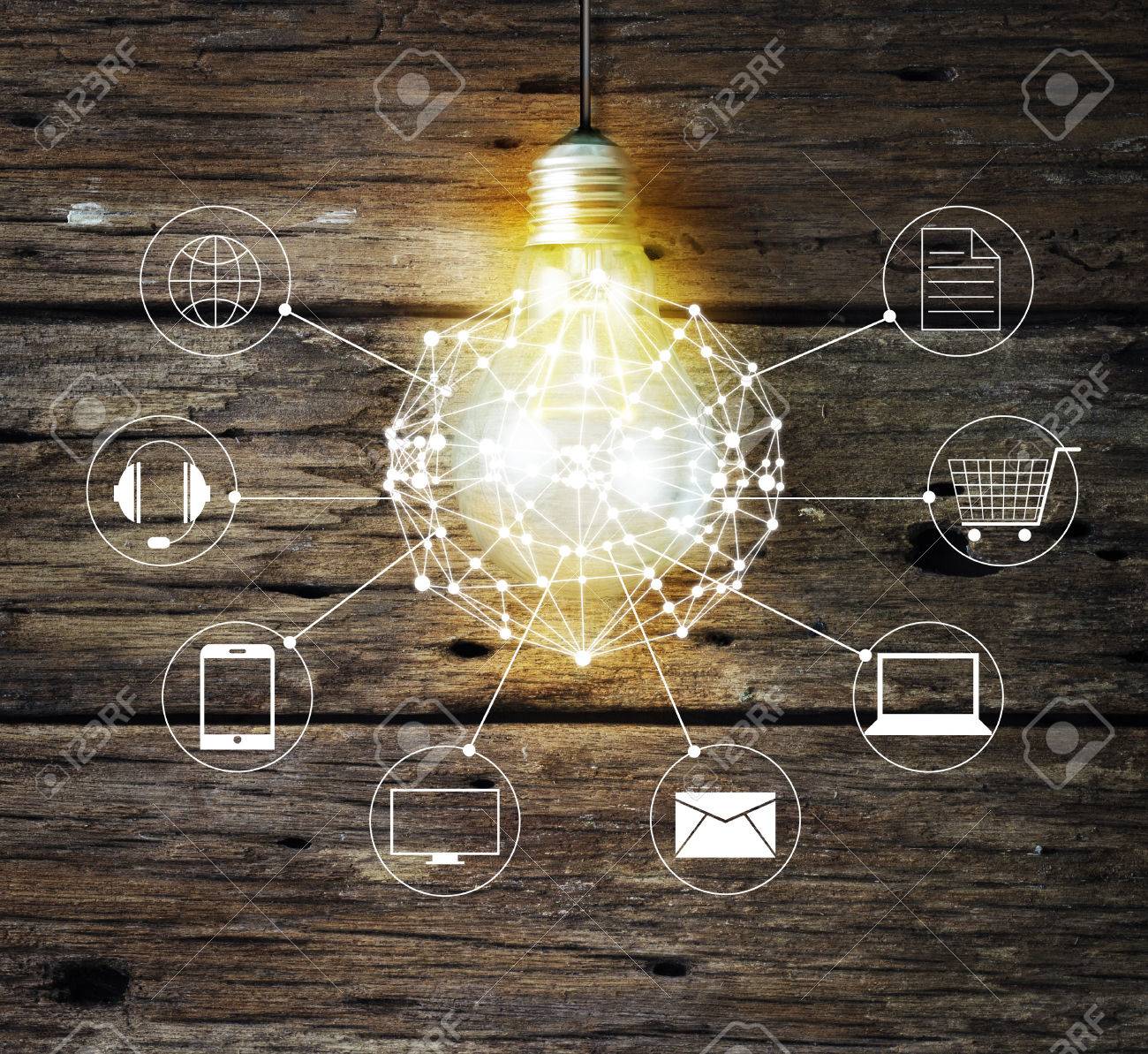 Light bulb circle global and icon customer network connection on wooden background, Omni Channel or Multi channel - 60007103 Light bulb circle global and icon customer network connection on wooden background, Omni Channel or Multi channel - 60007103
