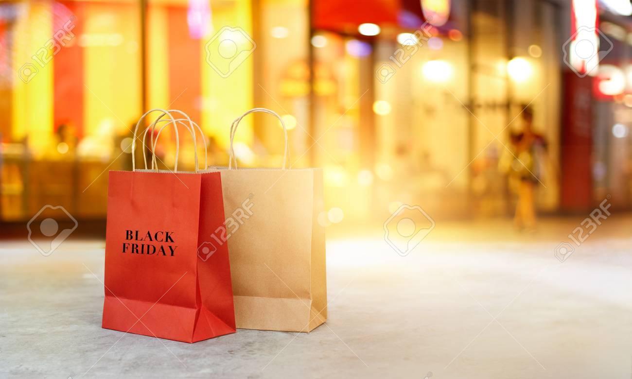 Black Friday Shopping Bags On Floor Front The Mall Store At Night