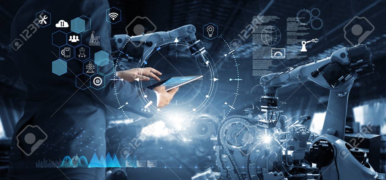 Manager Technical Industrial Engineer working and control robotics with monitoring system software and icon industry network connection on tablet. AI, Artificial Intelligence, Automation robot arm - 126271254 Manager Technical Industrial Engineer working and control robotics with monitoring system software and icon industry network connection on tablet. AI, Artificial Intelligence, Automation robot arm - 126271254