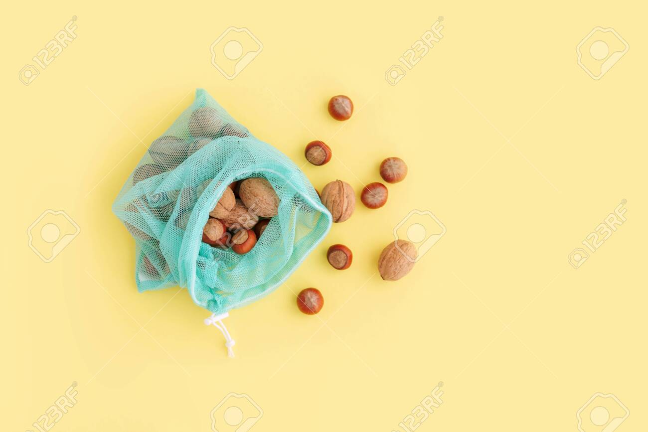 Download Reusable Bag With Nuts On Yellow Background Zero Waste And Plastic Stock Photo Picture And Royalty Free Image Image 120636590 Yellowimages Mockups