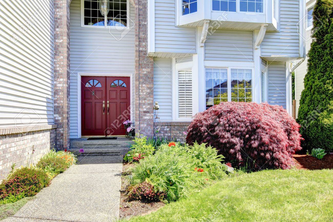 Large American Grey House With Red Door