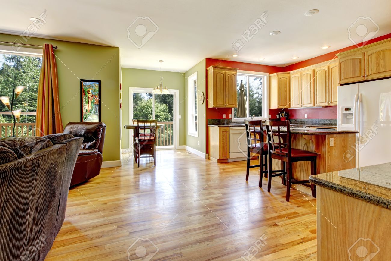 Kitchen With Yellow Wood Floor And Green Wall Near Living Room Kitchen With Yellow Wood Floor And Green Wall Near Living Room