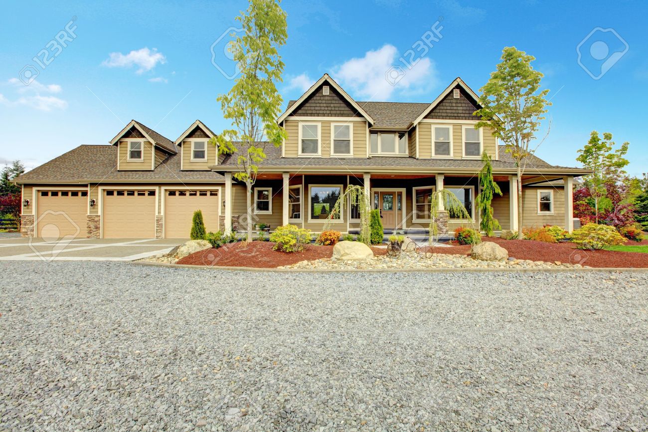 Large farm country house with gravel driveway and green landscape. - 17848845 Large farm country house with gravel driveway and green landscape. - 17848845