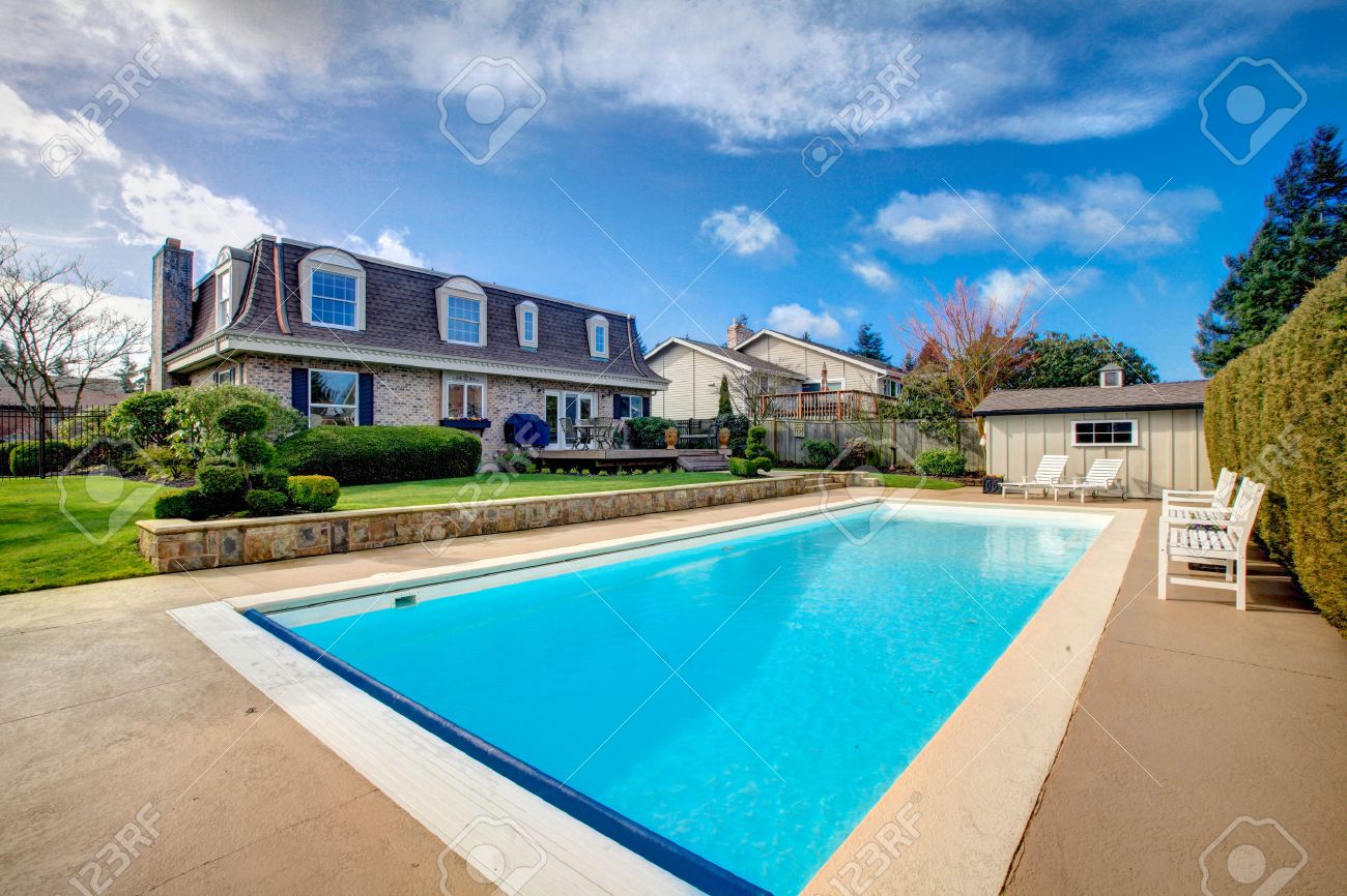 Two Story Stone Facing House With Back Porch And Big Swimming Stock Photo Picture And Royalty Free Image Image 25430328
