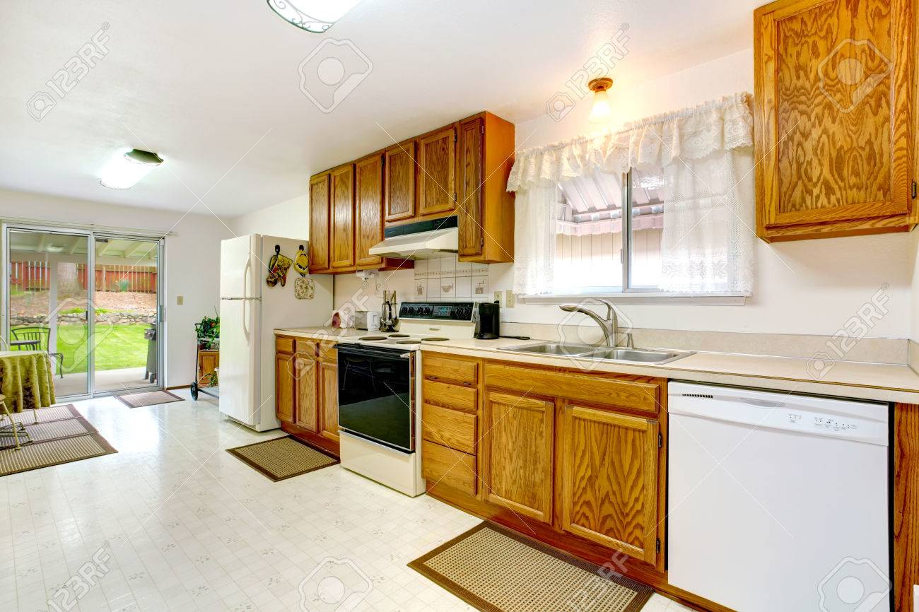 White Kitchen Appliances With Wood Cabinets bright kitchen with wood cabinets, tile floor, white appliances White Kitchen Appliances With Wood Cabinets bright kitchen with wood cabinets, tile floor, white appliances