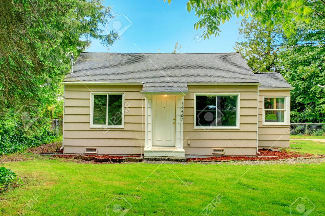 Small Old Clapboard Siding House With Tile Roof Stock Photo Picture And Royalty Free Image Image 27523020