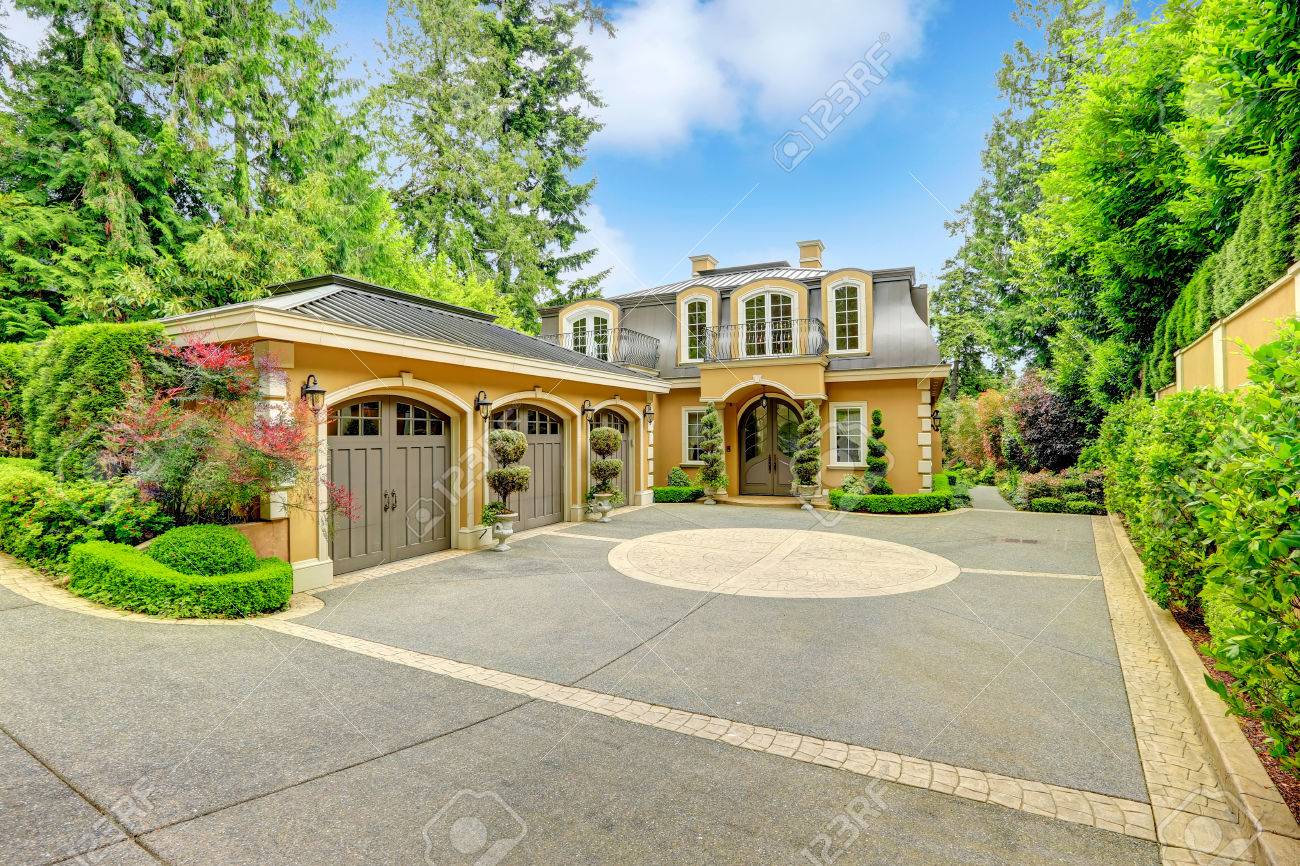 Luxury House With Beautiful Curb Appeal View Of Three Car Garage And Driveway Stock Photo Picture And Royalty Free Image Image 27534814