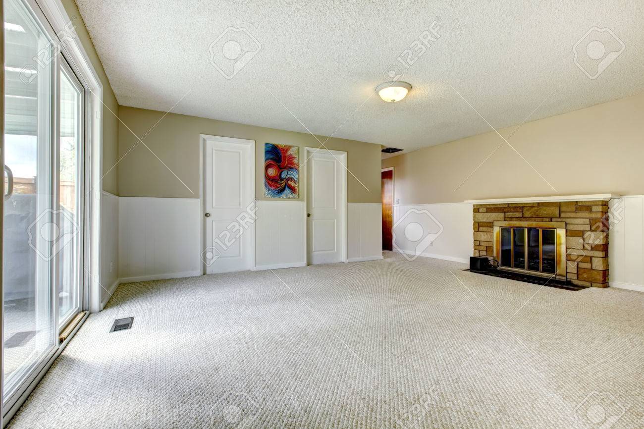 Empty Room With Siding Wall Trim, Carpet Floor, Stone Background Empty Room With Siding Wall Trim, Carpet Floor, Stone Background