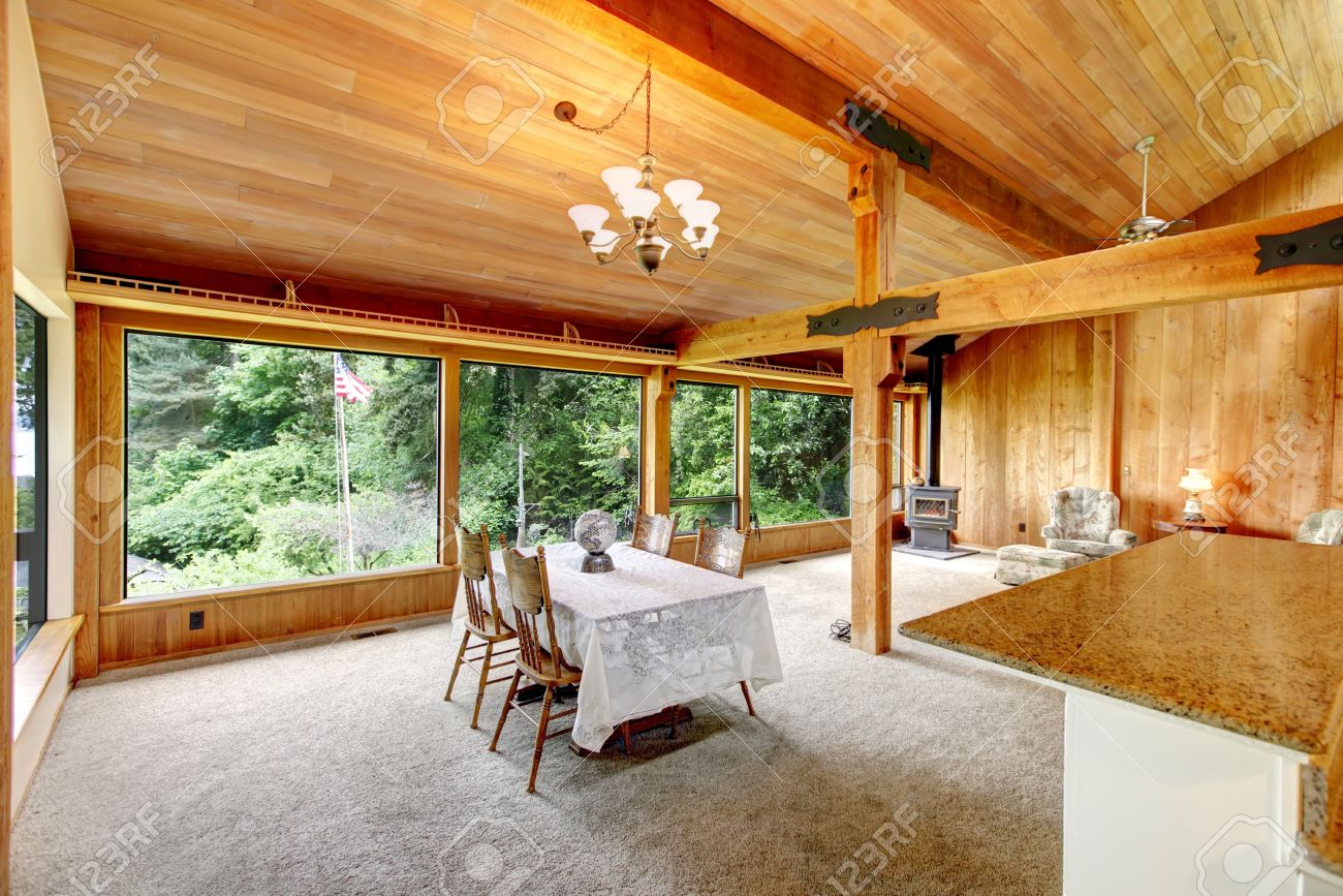 open floor plan in log cabin house. view of living room with open floor plan in log cabin house. view of living room with