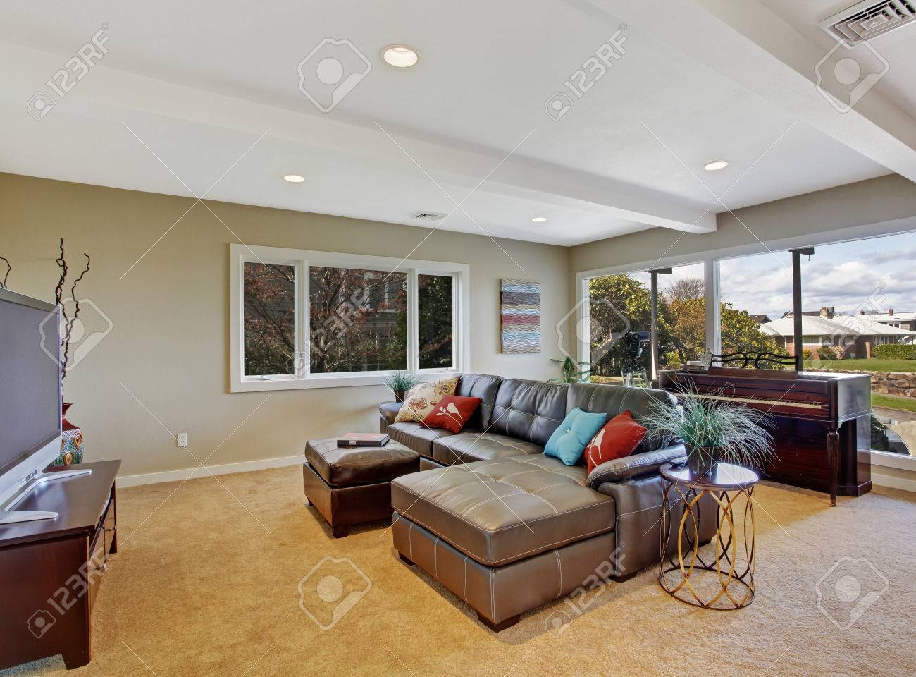 Living Room With Large Leather Couch Tv And Piano Stock Photo Picture And Royalty Free Image Image 29938667