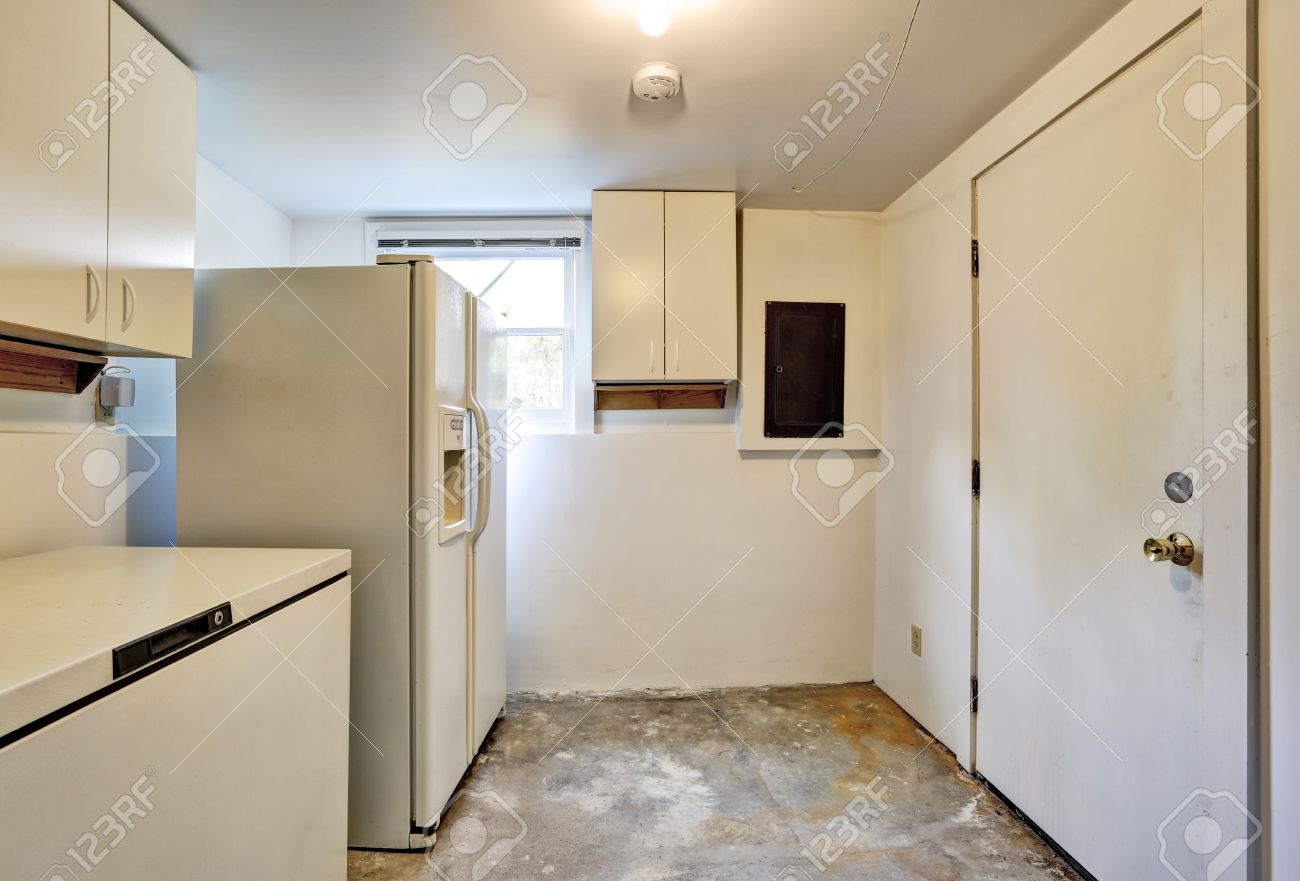 Old Ugly Room In House Basement With White Cabinets Old