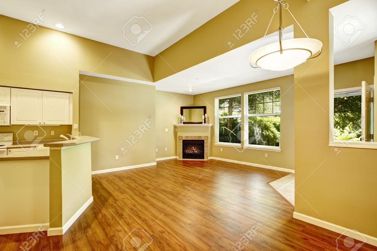 empty apartment with open floor plan. living room with hardwood empty apartment with open floor plan. living room with hardwood