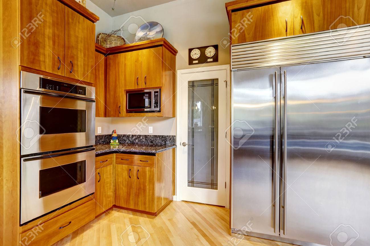 refrigerator in kitchen corner corner pizza oven kitchen corner in luxury house steel stainless appliance large refrigerator and black granite tops corner in luxury house stainless appliance large refrigerator in kitchen corner corner pizza oven kitchen corner in luxury house steel stainless appliance large refrigerator and black granite tops corner in luxury house stainless appliance large