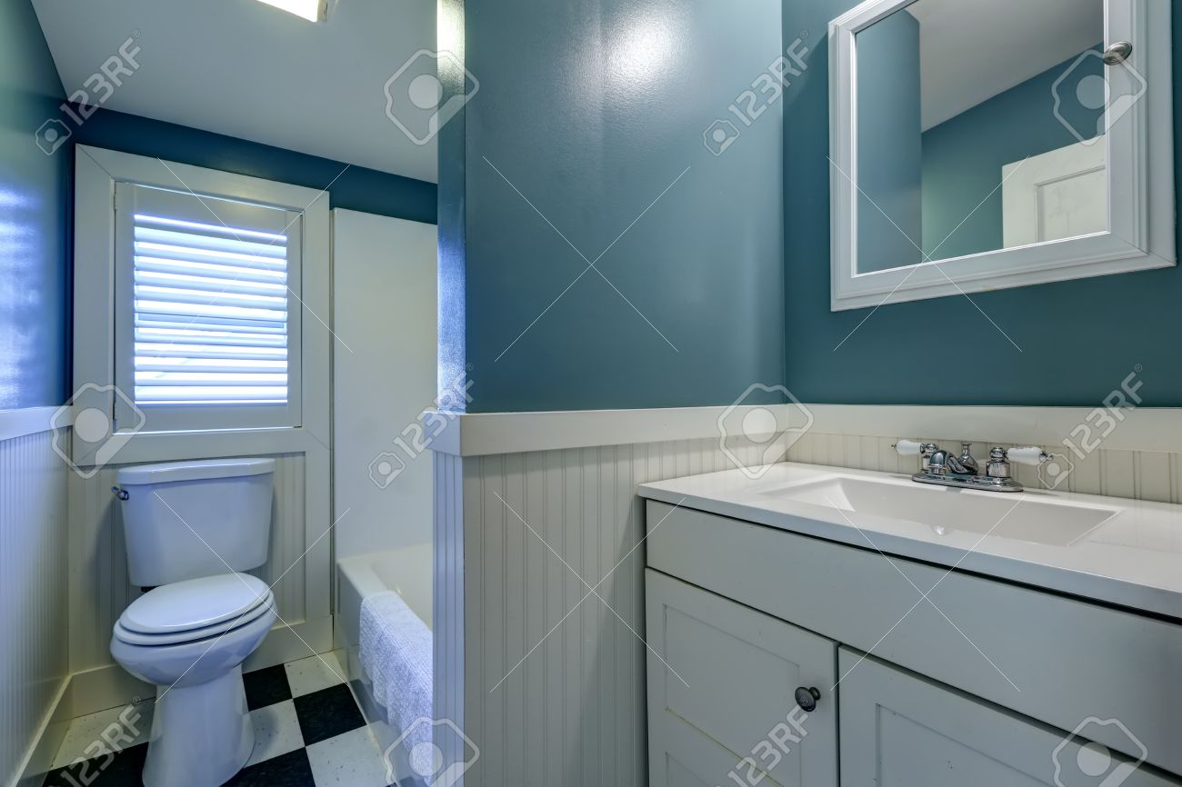 blue bathroom interior with white wall trim stock photo, picture blue bathroom interior with white wall trim stock photo, picture