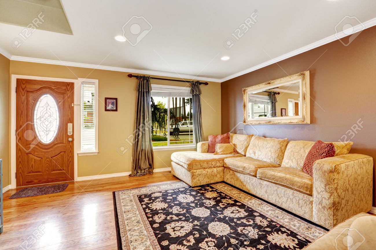 Living Room With Brown And Ivory Color Walls. Creamy Tone Sofa With Red Pillows Stock Photo, Picture And Royalty Free Image. Image 32040216. Living Room With Brown And Ivory Color Walls. Creamy Tone Sofa With Red Pillows Stock Photo, Picture And Royalty Free Image. Image 32040216.