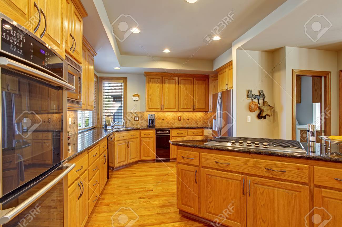 Spacious Kitchen Room With Maple Storage Combination Kitchen