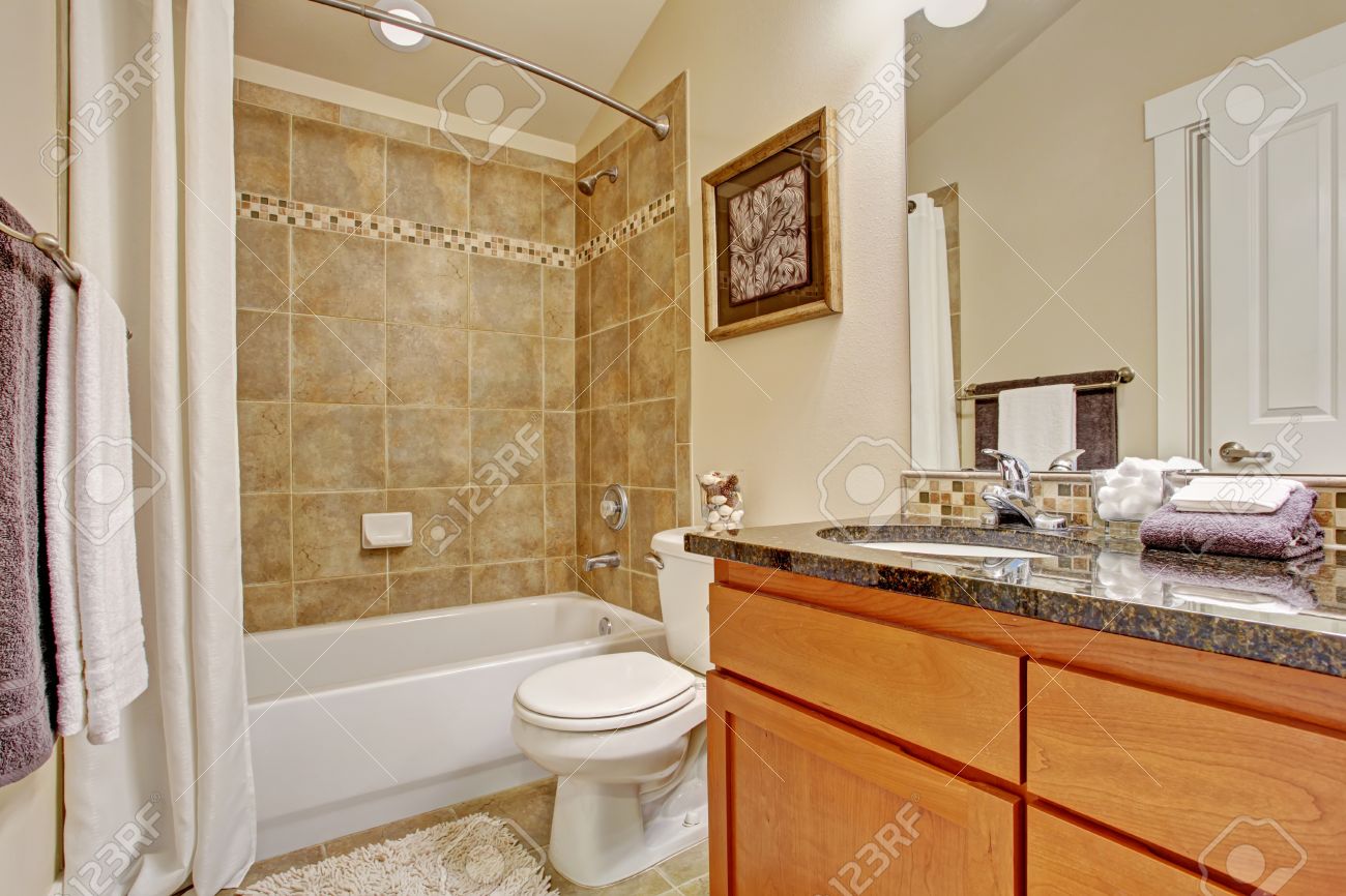 Bathroom Interior Maple Cabinet With Granite Top And Mirror