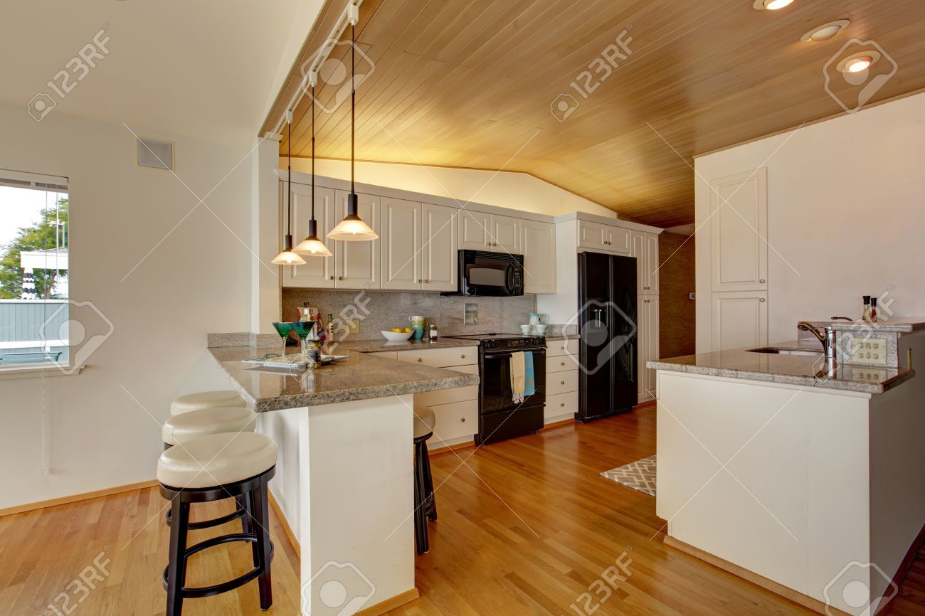 kitchen room with paneled ceiling white cabinets with black kitchen room with paneled ceiling white cabinets with black