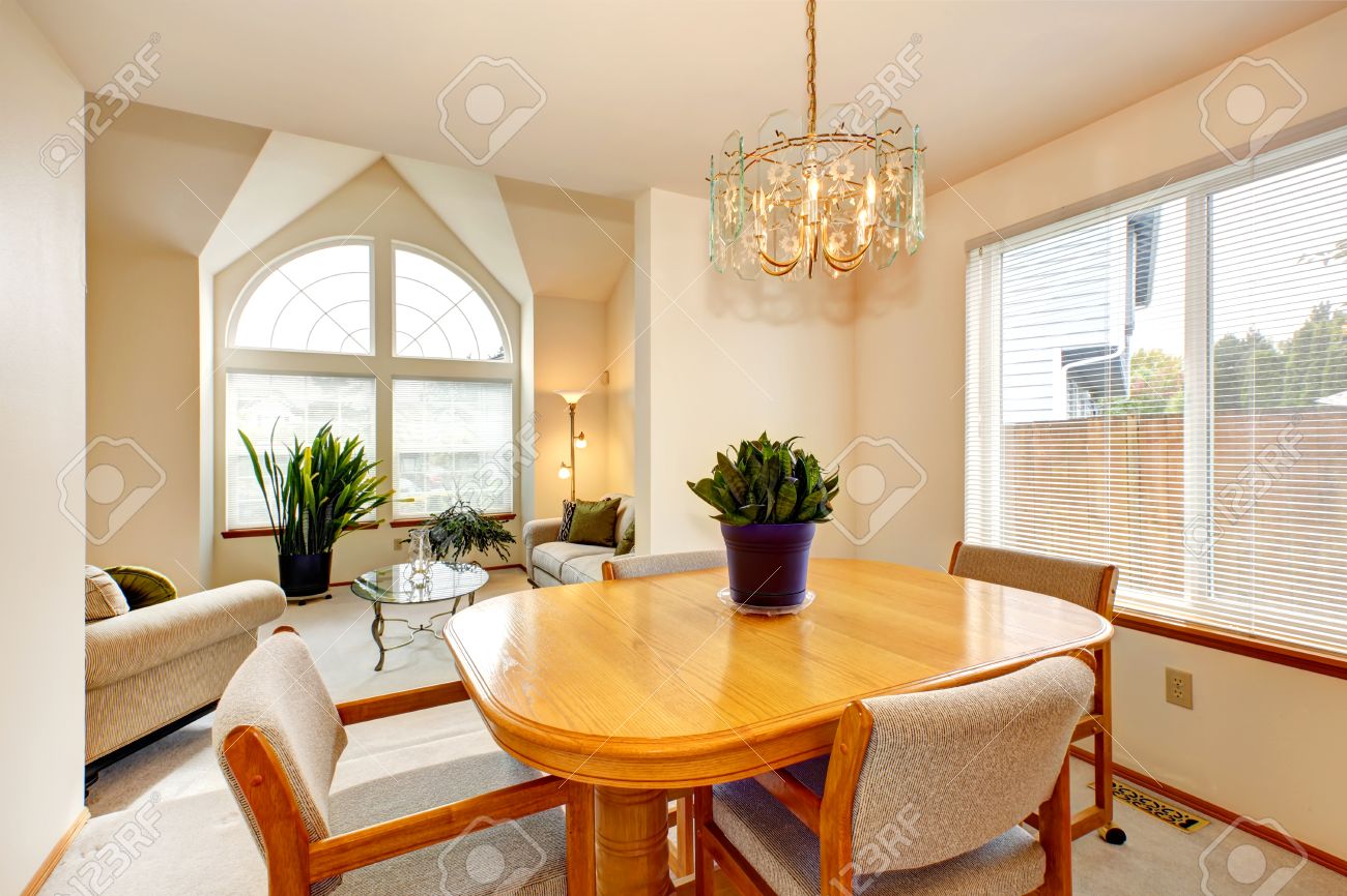 Bright Dining Area With Maple Dining Table Set And Living Room ... Bright Dining Area With Maple Dining Table Set And Living Room ...