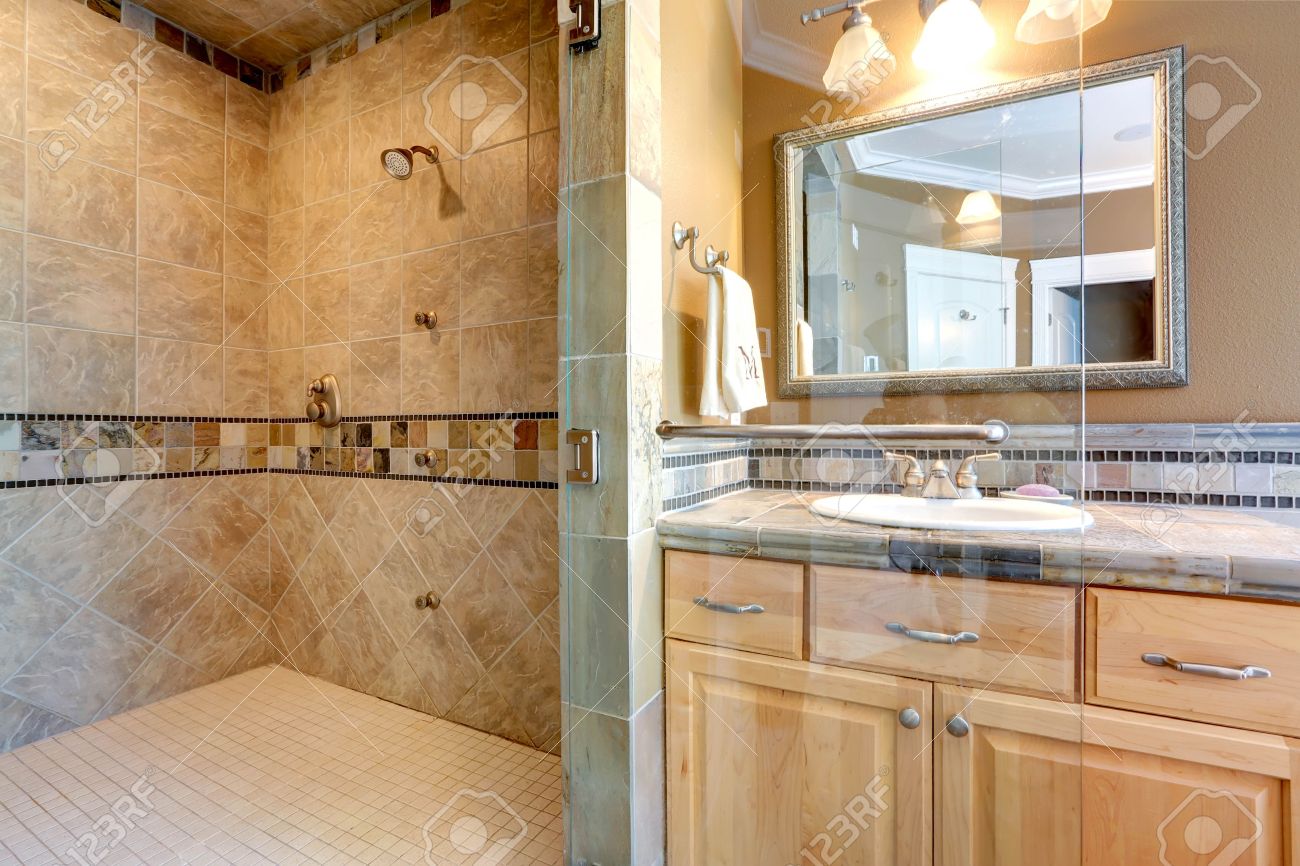 Luxury Bathroom Interior With Tile Wall Trim Open Shower And