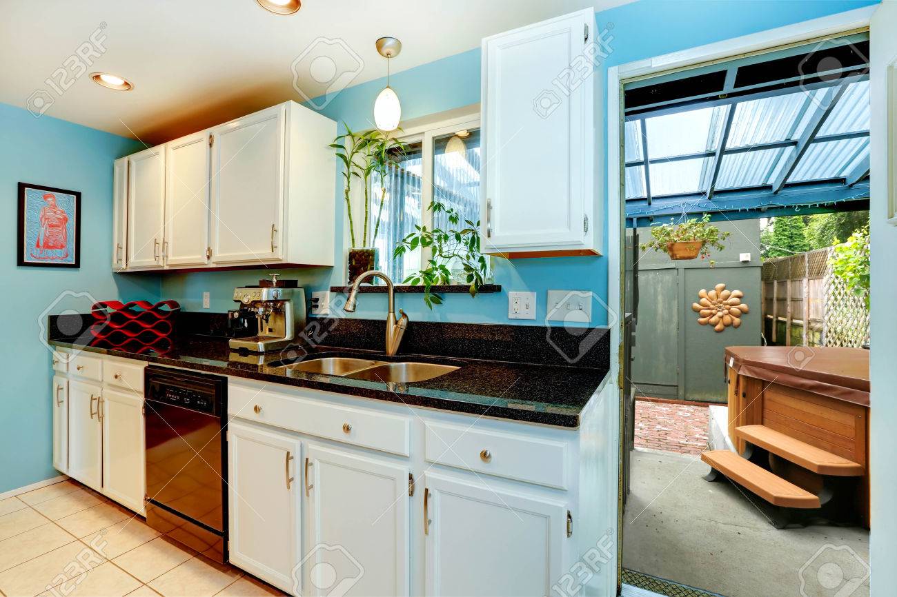 Light Blue Kitchen Room With White Cabinets And Black Counter Light Blue Kitchen Room With White Cabinets And Black Counter