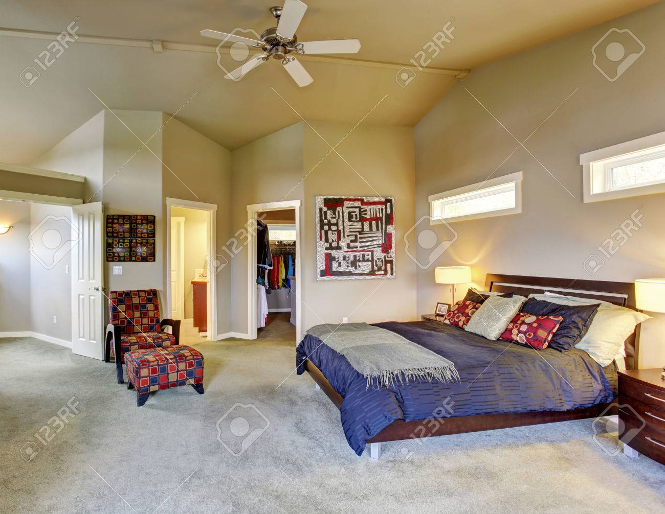 Large Master Bedroom With Windows Fireplace Colorful Furniture