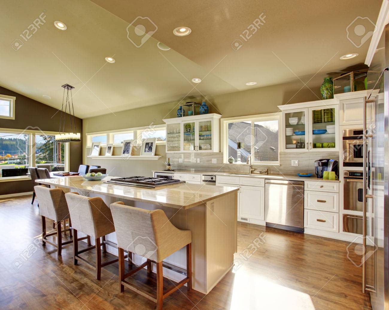 Beautiful New Hard Wood Floor Kicthen With Windows And Lots Of