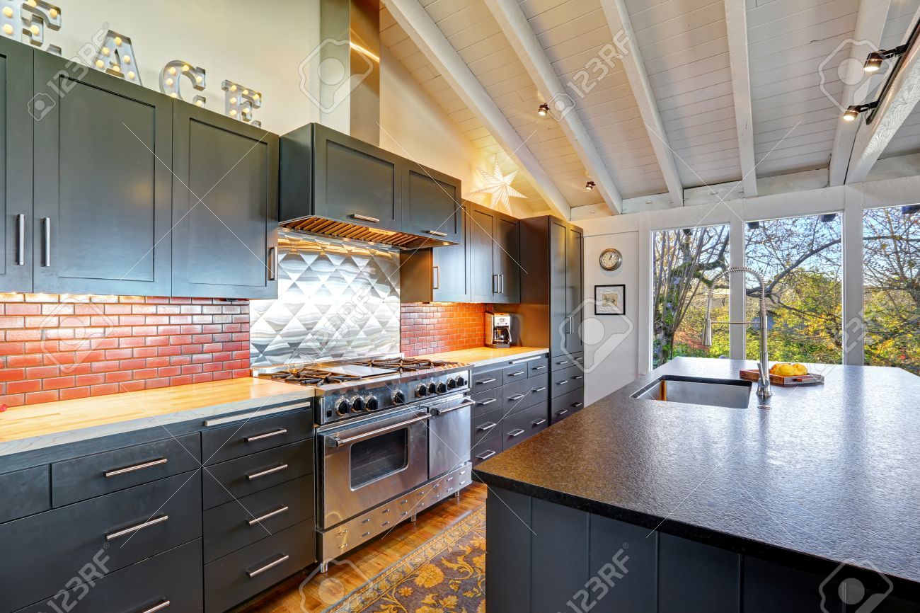 Luxury Beautiful Dark Modern Kitchen With Vaulted Wood Ceiling Luxury Beautiful Dark Modern Kitchen With Vaulted Wood Ceiling