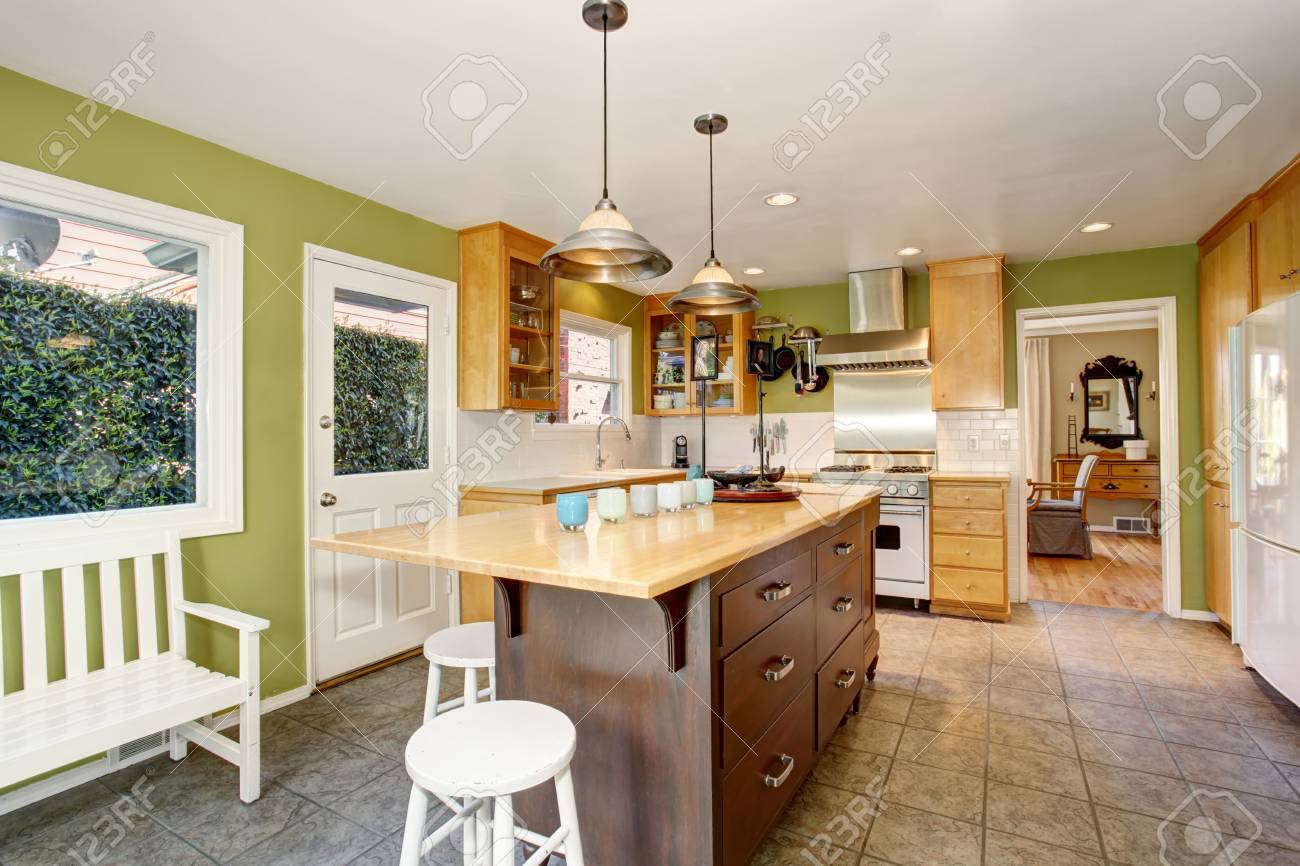 Kitchen Room Interior With Green Wall And Tile Floor Furnished