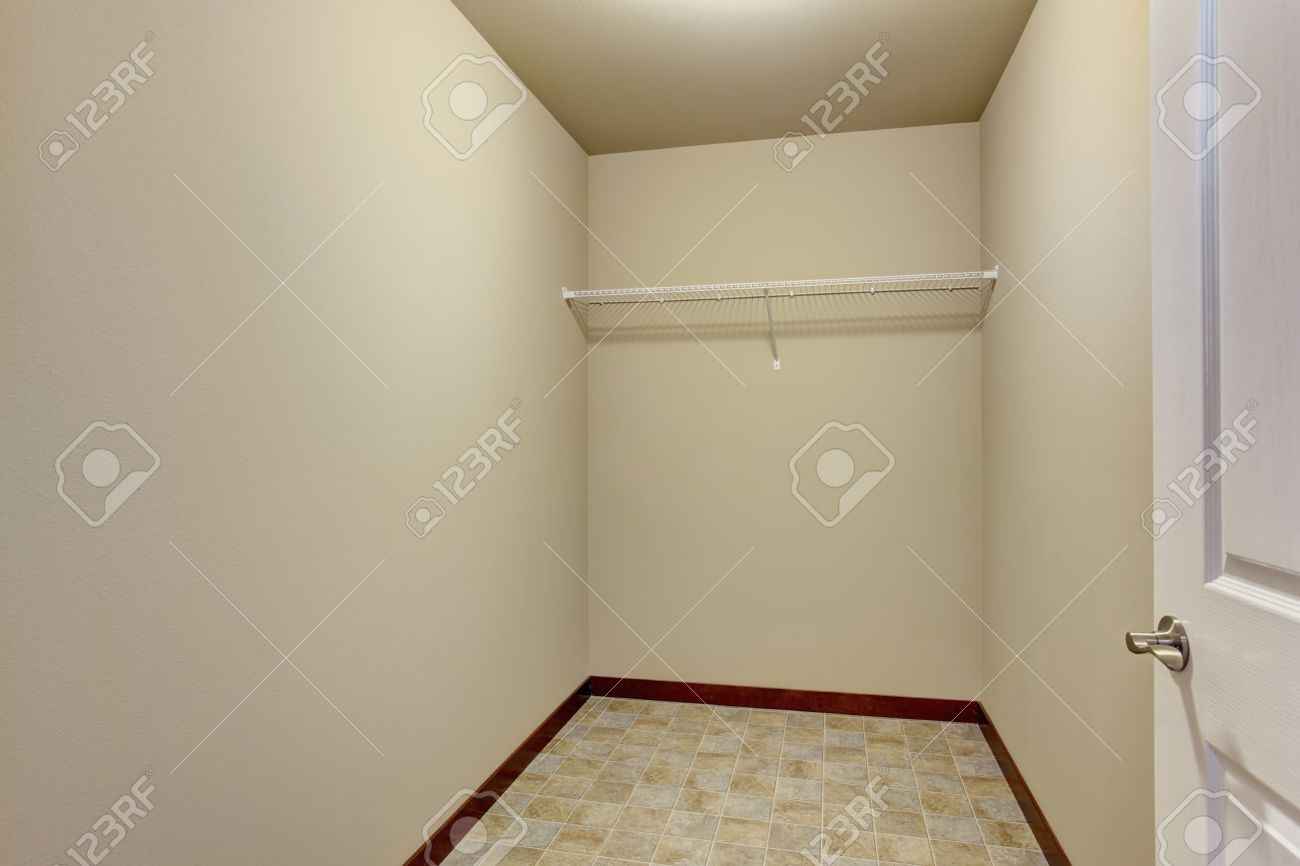empty narrow walkin closet with shelves and tile floor stock photo 59996924 empty walk in69 closet