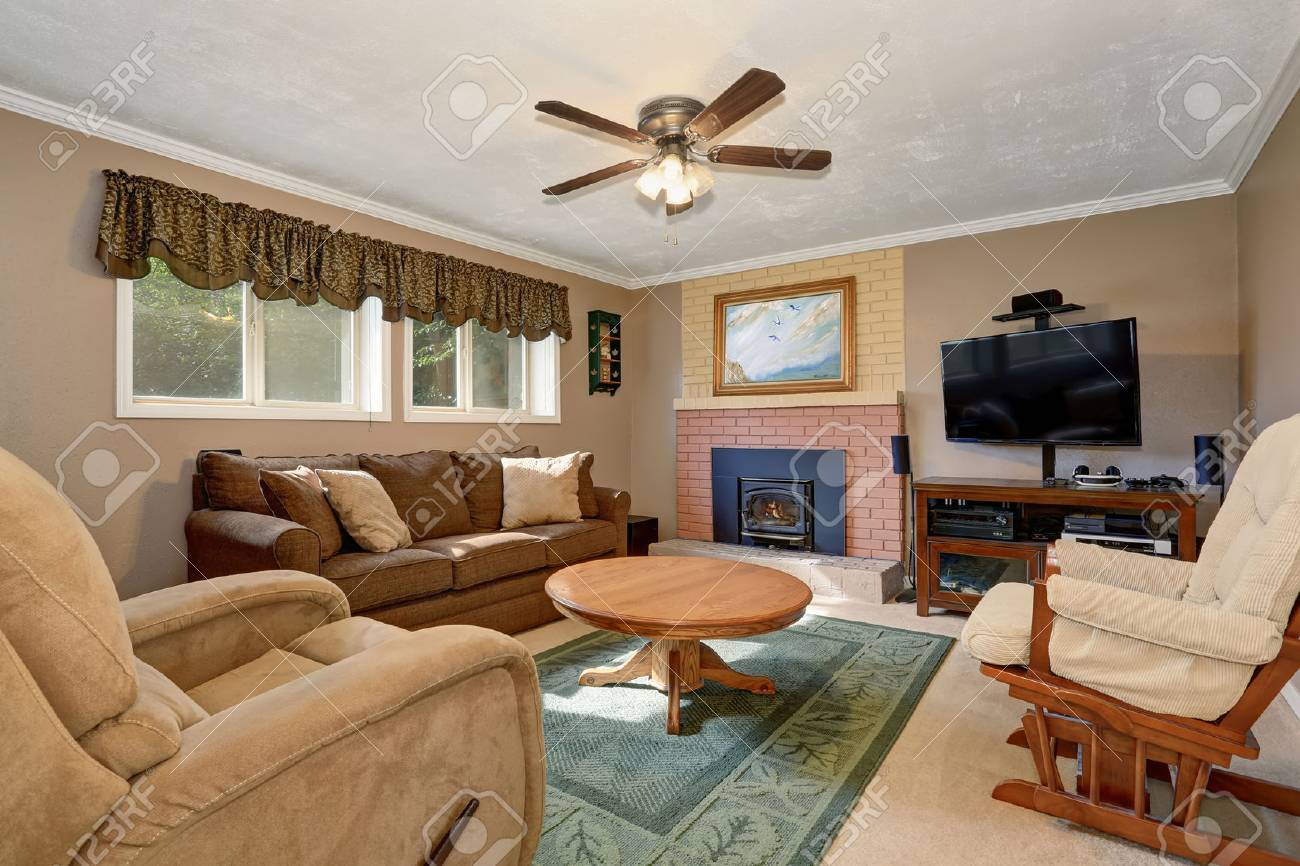 Typical American Living Room With Brown Couch Typical American Living Room With Brown Couch