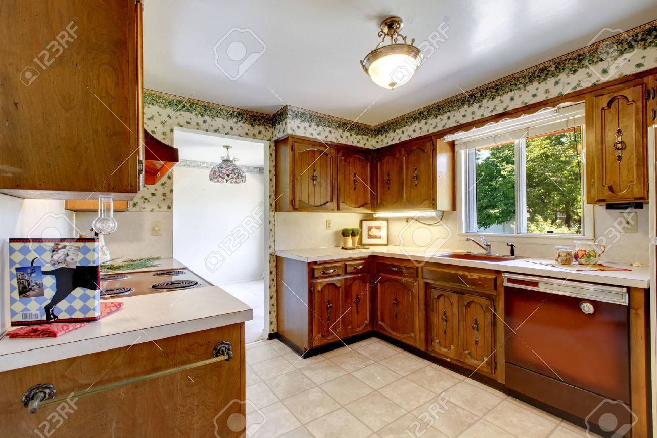 Empty Simple Old Kitchen With Tile Flooring And Vintage Cabinets Stock Photo Picture And Royalty Free Image Image 61133736