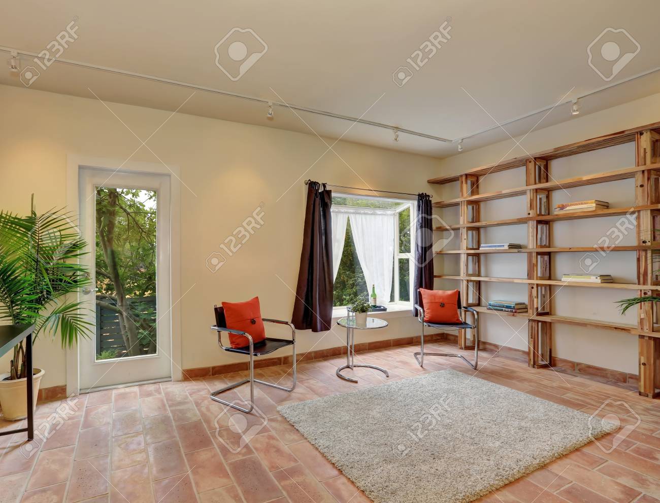 Cozy Sitting Room With Modern Chairs Tile Flooring Rug And Stock Photo Picture And Royalty Free Image Image 61133105