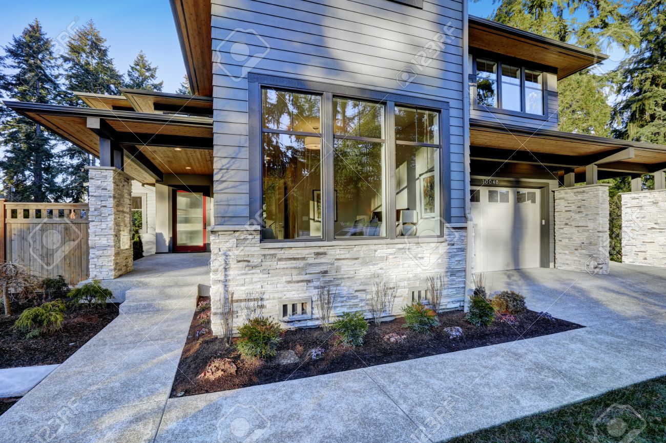 Entrance Of Luxurious New Construction Home With Blue Siding.. Stock ... Entrance Of Luxurious New Construction Home With Blue Siding.. Stock ...