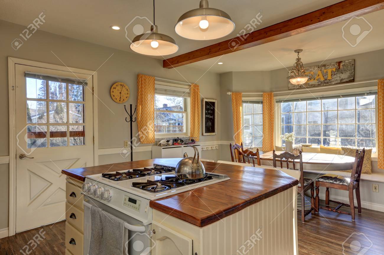 Newly Renovated Kitchen And Breakfast Nook Boasts Wood Beams