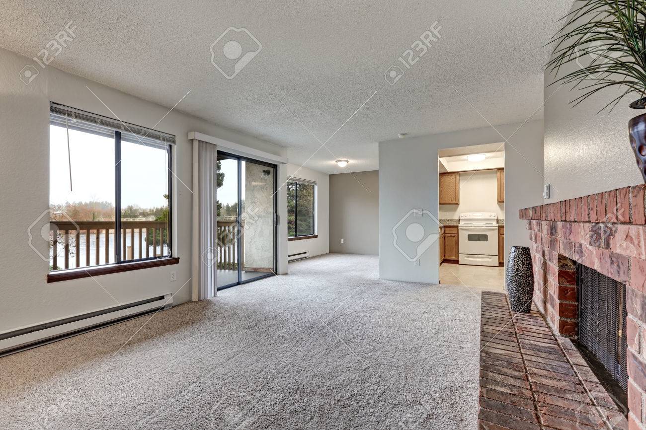 Empty Living Room Features White Walls Carpet Floor Red Brick Stock Photo Picture And Royalty Free Image Image 72425983
