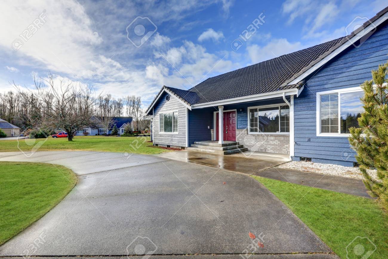 Beautiful Rambler House With Tile Roof, Blue Siding, Covered Porch With  Double Red Front Door And Concrete Driveway. Northwest, USA Stock Photo,  Picture and Royalty Free Image. Image 72489214., image size:1300x866