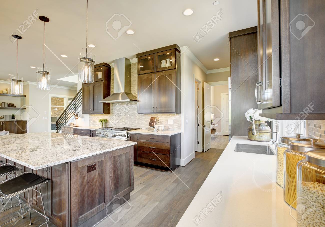 Luxury Kitchen Accented With Large Granite Kitchen Island, Taupe - Luxury Kitchen Accented With Large Granite Kitchen Island, Taupe