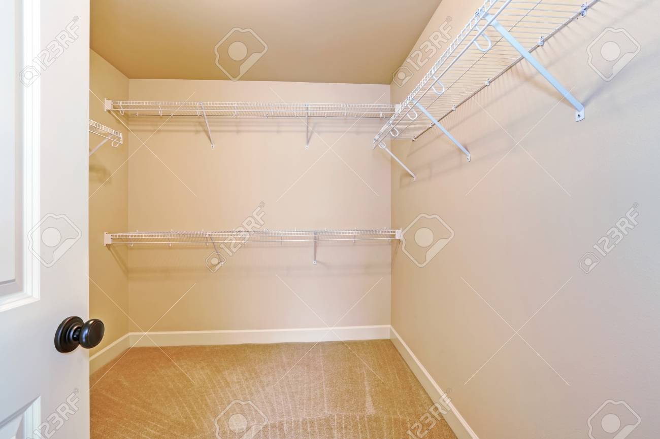 empty walk in closet royalty free empty walk in closet with shelves and carpet floor northwest usa stock photo walk in closet with shelves and carpet floor northwest empty walk in closet royalty free empty walk in closet with shelves and carpet floor northwest usa stock photo walk in closet with shelves and carpet floor northwest