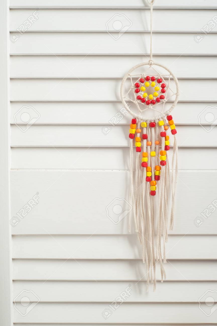 Rustic Dream Catcher With Red And Yellow Wooden Beads In The Interior Toys Letters Rustic Dream Catcher With Red And Yellow Wooden Beads In The Interior Toys Letters