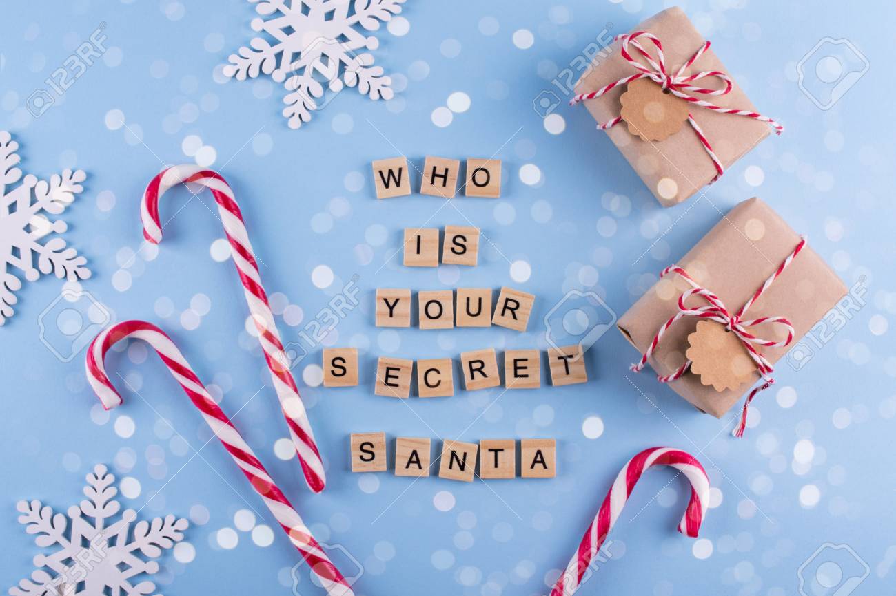 113634066-secret-santa-christmas-game-wrapped-gift-boxes-with-notes-candy-cane-on-blue-pastel-background-top-v.jpg 113634066-secret-santa-christmas-game-wrapped-gift-boxes-with-notes-candy-cane-on-blue-pastel-background-top-v.jpg