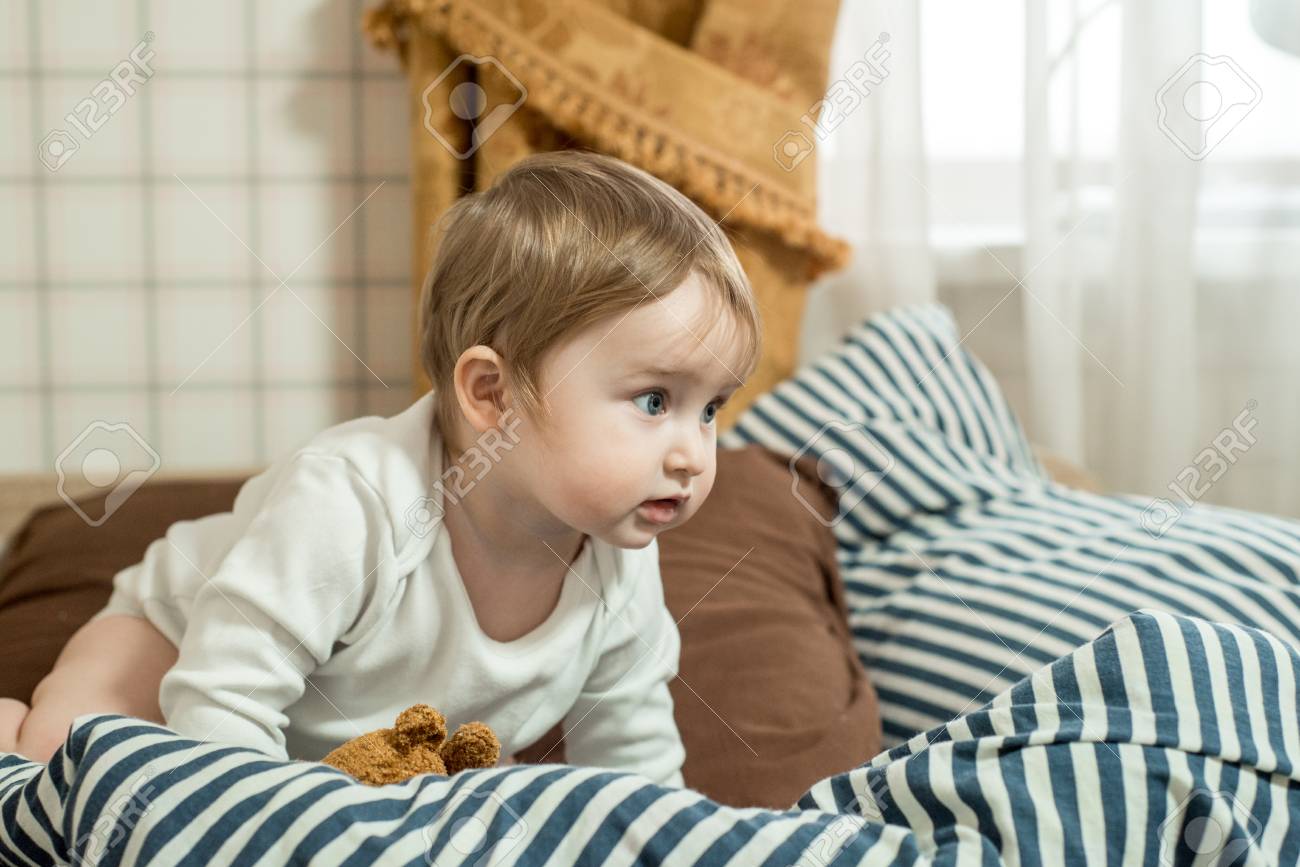 child and teddy bear