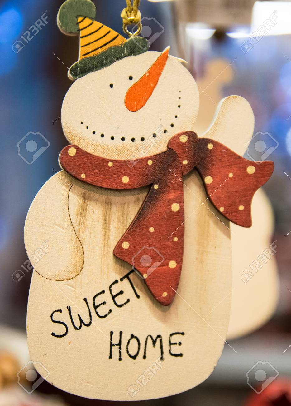 snowman carved in wood