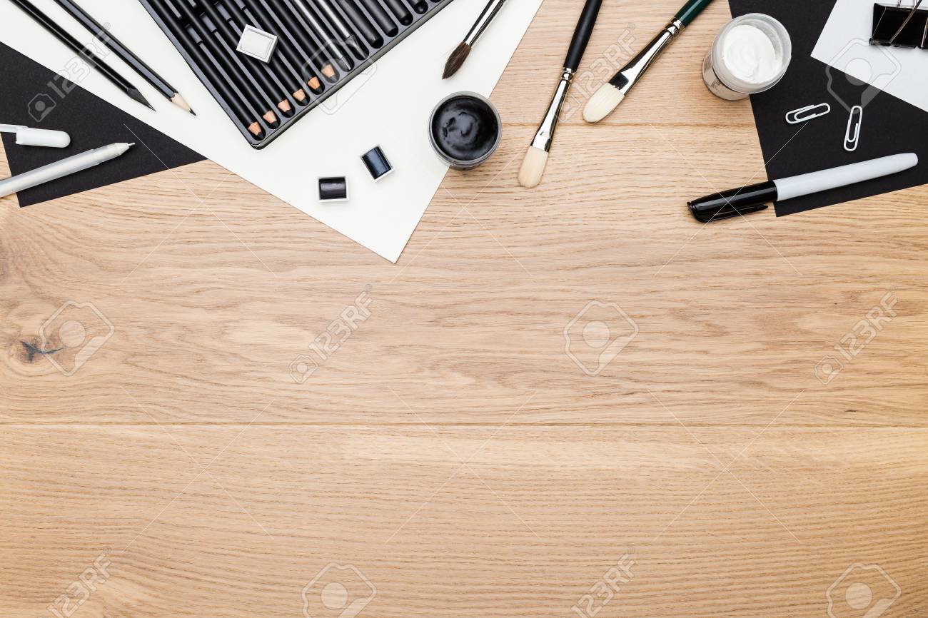 Top View Of Wooden Tabletop With Drawing Tools And Stationery Items. Mock  Up Stock Photo, Picture and Royalty Free Image. Image 56945080., image size:1300x866