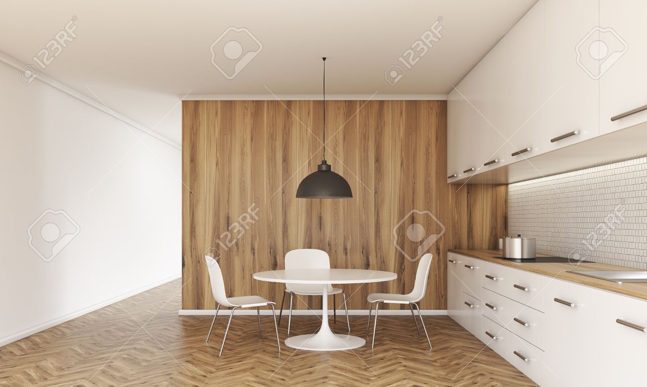 Interior De La Cocina Con Una Pequeña Mesa De Comedor Y Sillas ... Interior De La Cocina Con Una Pequeña Mesa De Comedor Y Sillas ...