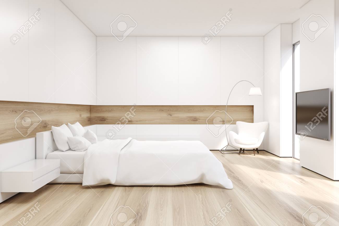 Vista Lateral Del Dormitorio Con Una Cama Doble Con Cubiertas