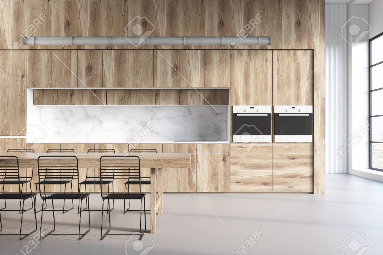 Interior De Cocina De Madera Con Una Mesa, Tres Sillas Y Encimeras ... Interior De Cocina De Madera Con Una Mesa, Tres Sillas Y Encimeras ...