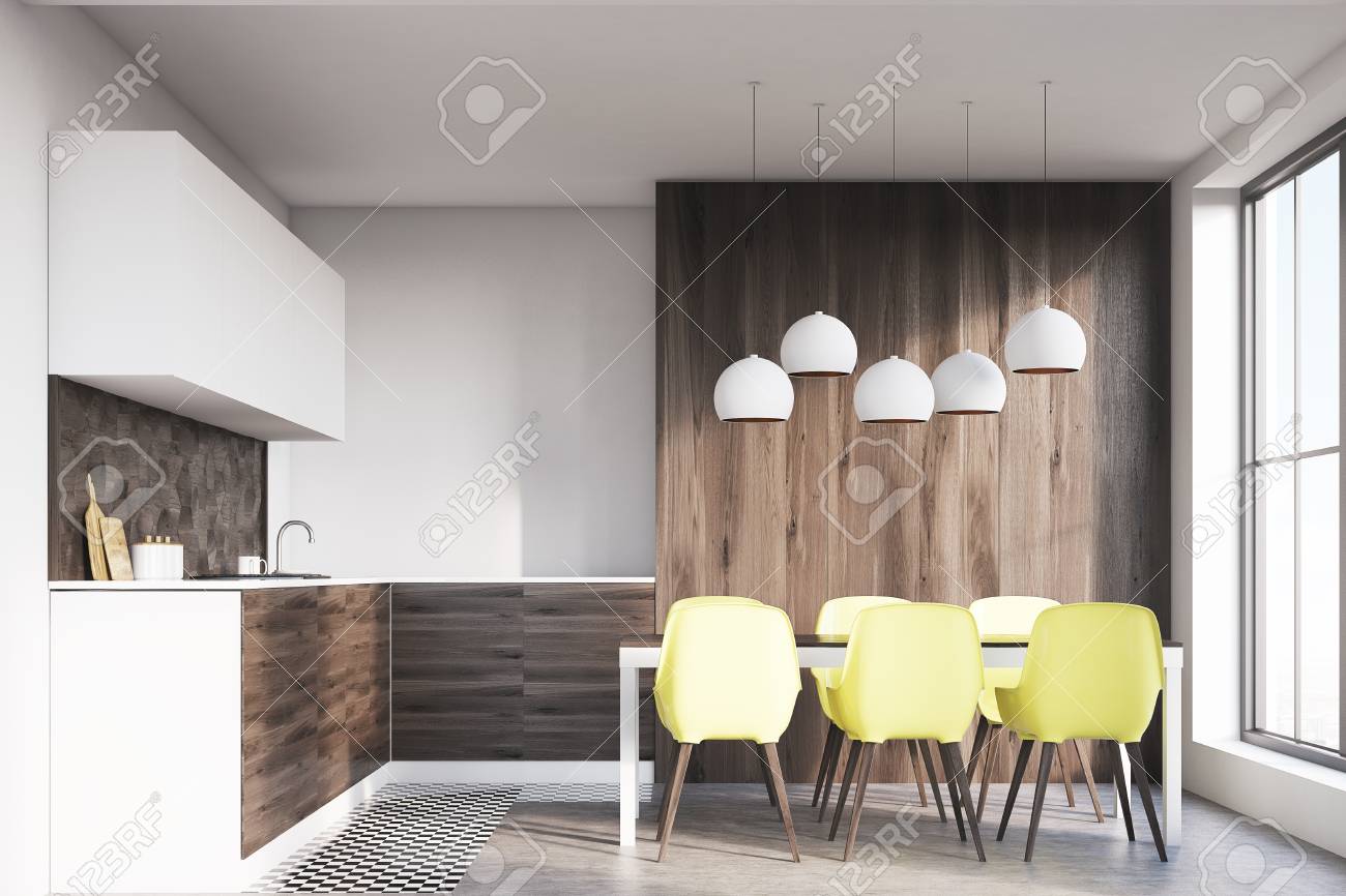 Dark Wooden Kitchen Interior With White Walls And Wooden Floor Stock Photo