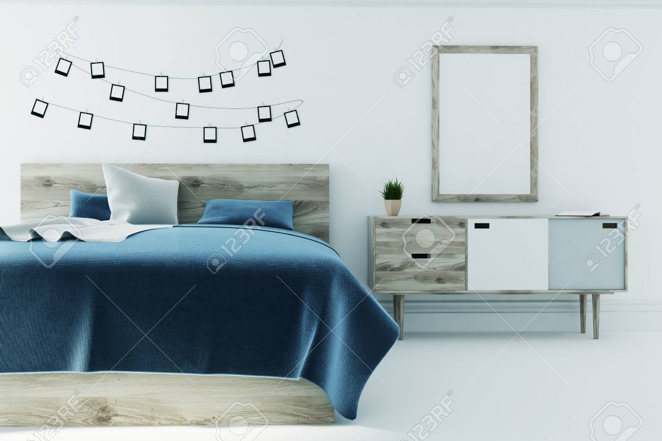 White Bedroom Interior With A Dark Gray Bed Cover A Wooden Bed