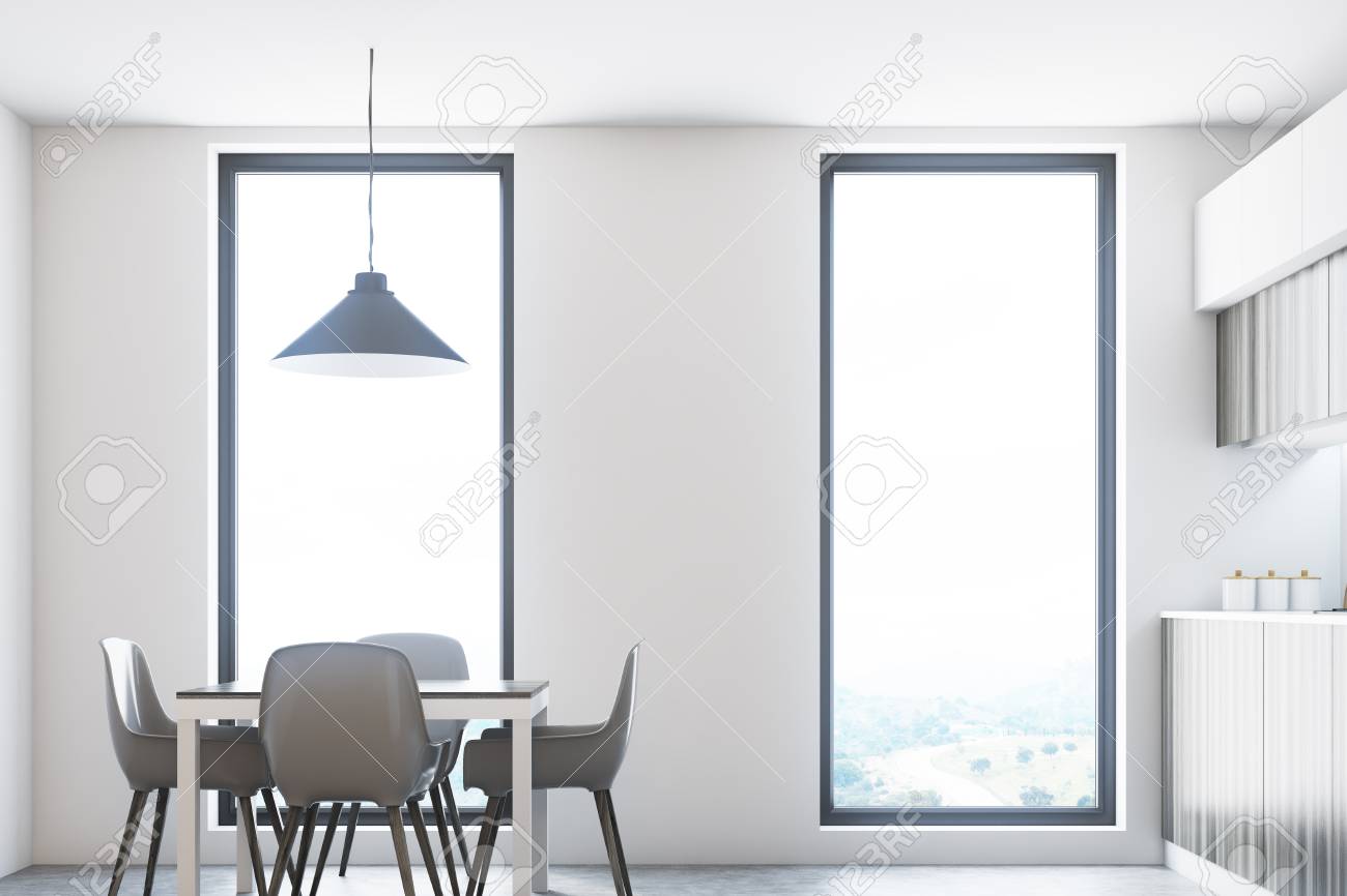 Ciérrese Para Arriba De Una Mesa De Comedor Cuadrada Con Cuatro ... Ciérrese Para Arriba De Una Mesa De Comedor Cuadrada Con Cuatro ...